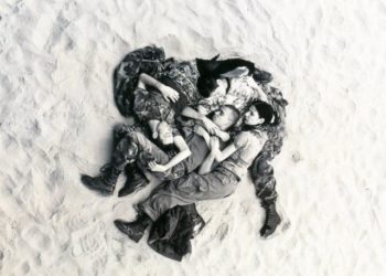 wolfgang-tillmans-1993-lutz-alex-suzanne-christoph-on-beach.jpg