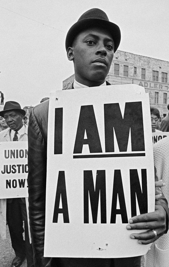 Mourner with sign at the King memorial service Bob Adelman 1968_Bob Adelman