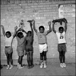 Children playing gangsters. South Dallas, 1988.