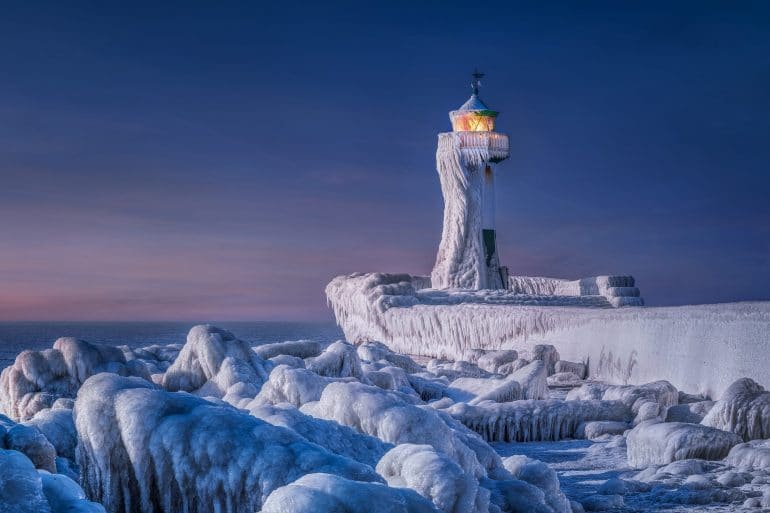 Frozen Lighthouse by Manfred Voss CEWE Photo Award Category winner Landscapes