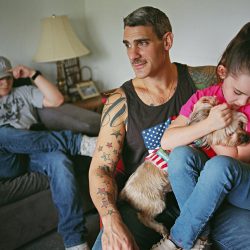 Johnny with his husband and children. Totowa, New Jersey © Bart Heynen from 'Dads' published by powerHouse Books
