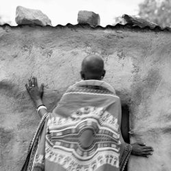 Maseriana Lenyirai, entering her home, Partimbo, near Kiteto, Manyara Region, Tanzania. 2018 © Pradip Malde 'From Where Loss Comes'