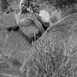 Piliska Marwa and Dorcas Elias Langi on Susuni Mountain Wanchari clan territory, near Tarime, Tanzania. 2018 © Pradip Malde 'From Where Loss Comes'
