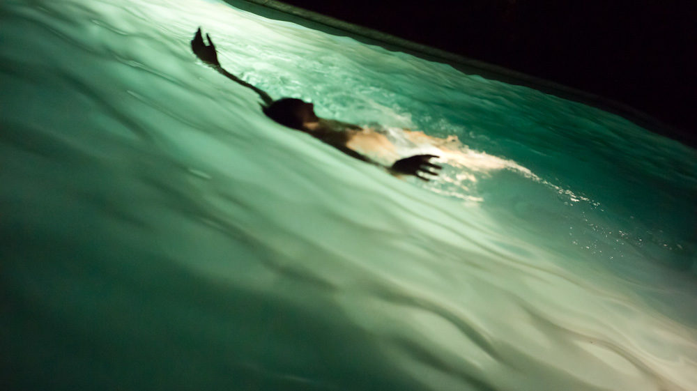Swimming by the pool