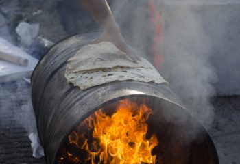 Bread cooking in Calais camp