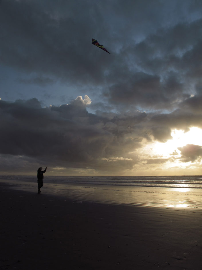 Child plays kite
