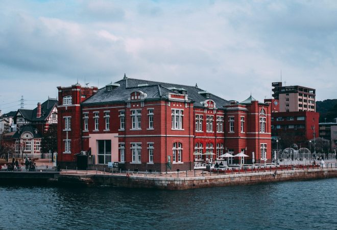 Coffee time under white umbrellas.